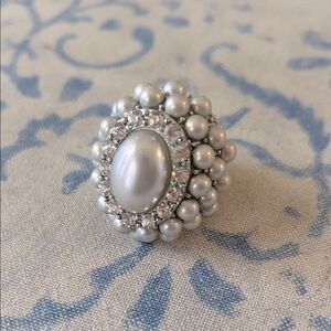 NWOT.  Women’s silver colored faux pearl and rhinestone statement ring.